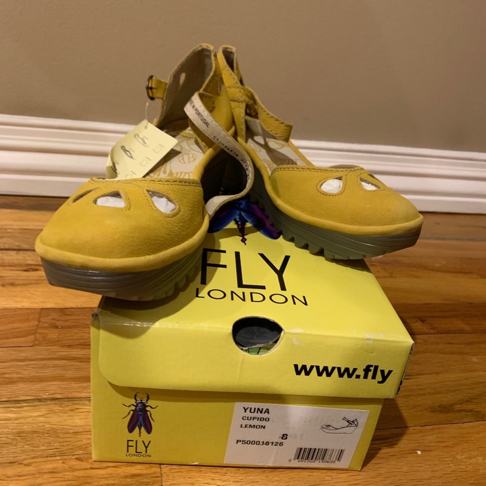 Brand new Fly London wedge shoe